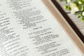 Psalm 114, open holy bible book on wooden table, close-up