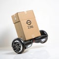 PSD delivery package on hoverboard isolated on transparent background Royalty Free Stock Photo