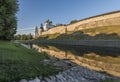 Pskov Kremlin from the side of the Pskova river at sunrise. Royalty Free Stock Photo