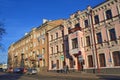 Pskov, Russia, December, 31, 2017. People walking near houses 2 and 4 on Oktyabrsky Avenue. Building 4 - architectural monument,