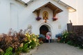 Pskov, Russia, September 6, 2023. The entrance to the Church of Vasily on Gorka decorated with flowers.