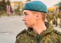 Portrait of young soldier of Special Armed Forces Russian military with blue beret on the square of Pskov, Russia