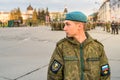 Portrait of young soldier of Special Armed Forces Russian military with blue beret on the square of Pskov, Russia