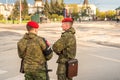 Two soldiers of Special Forces Russian military with red berets on the square of Pskov, Russia