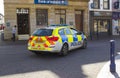 A PSNI police patrol car cruising the pedestrian zone in the Diamond in Coleraine, Northern Ireland