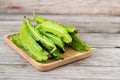 Psophocarpus tetragonolobus, Winged Bean on wood table