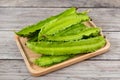 Psophocarpus tetragonolobus, Winged Bean on wood table