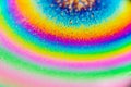 Psychedelic abstract planet from soap bubble, Light refraction on a soap bubble, Macro Close Up moving particles Rainbow colors on