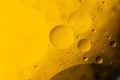 Psychedelic blueand yellow oil and water abstract background. Abstract colorful background. Foam of Soap with Bubbles macro shot.