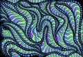 Psychedelic colorful surreal doodle pattern, gradient colors. Decorative abstract texture with maze of ornaments