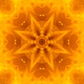 Psychedelic fire fractal kaleidoscope mandala gradient bright orange, yellow colors on brown background.