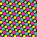 Psychedelic small circles on a black background seamless pattern