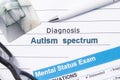 Psychiatric Diagnosis Autism Spectrum. Medical book or form with the name of diagnosis Autism Spectrum is on table of doctor surro Royalty Free Stock Photo