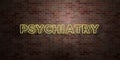 PSYCHIATRY - fluorescent Neon tube Sign on brickwork - Front view - 3D rendered royalty free stock picture