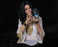 Psychic Fortune Teller With Crystal Ball on Black Background