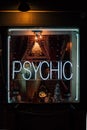 Psychic neon sign at night, in the West Village, Manhattan, New York City