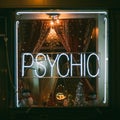 Psychic sign at night, in the West Village, New York City