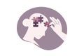 Psychologic therapy session concept. Helping hand adds missing jigsaw puzzle pieces. Woman with mental disorder, anxiety and