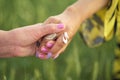 psychological benefits of maintaining social connections are evident in this tender image of two elderly women. hands Royalty Free Stock Photo