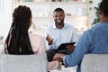 Psychological Help For Couples. Family Counselor Talking To Spouses During Therapy Session Royalty Free Stock Photo