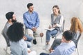 Diverse happy people sitting in trust circle on therapy session Royalty Free Stock Photo