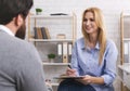 Psychologist having session with patient in office Royalty Free Stock Photo