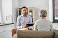 Psychologist listening to senior woman patient Royalty Free Stock Photo