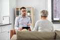 Psychologist listening to senior woman patient Royalty Free Stock Photo
