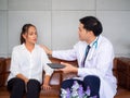 Psychologist metal health concept. Psychologist and depressed patient at office during consultation, The male doctor is treating Royalty Free Stock Photo