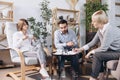 At a psychologist's appointment. Married couple, sad, depressed man and woman meeting with consultant to solve family Royalty Free Stock Photo