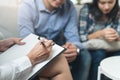 Psychologist talking with married couple about depression of husband Royalty Free Stock Photo