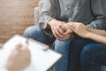 Psychologist talking with married couple about depression of husband Royalty Free Stock Photo