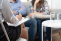 Psychologist talking with married couple about depression of husband Royalty Free Stock Photo