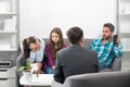 Psychologist with young couple, psychotherapist or marriage counselor listen mental health of couple and child. Father