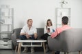 Psychologist with young couple, psychotherapist or marriage counselor listen mental health of couple. Psychological