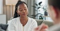 Psychology, mental health and empathy with a black woman therapist talking to a patient in her office. Support Royalty Free Stock Photo