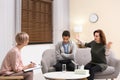 Psychotherapist working with African-American teenage boy and his mother Royalty Free Stock Photo