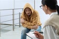 Psychotherapist working with drug addicted man indoors Royalty Free Stock Photo