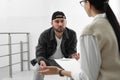 Psychotherapist working with drug addicted young man indoors Royalty Free Stock Photo