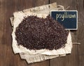 Psyllium seeds with a small chalkboard Royalty Free Stock Photo