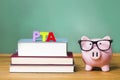 PTA theme with pink piggy bank with chalkboard Royalty Free Stock Photo