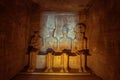 Ptah, Amun-Ra, Ramses and Ra-Horakhty sitting next to each other Royalty Free Stock Photo