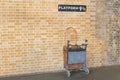 Ptattform Station 9 3/4 at king's cross statoon - Harry Potter Royalty Free Stock Photo