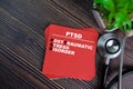 PTSD - Post Traumatic Stress Disorder write on sticky notes isolated on Wooden Table. medical concept Royalty Free Stock Photo