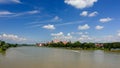 Ptuj, Slovenia, panoramic shot of oldest city in Slovenia with a castle overlooking the old town from a hill, clouds Royalty Free Stock Photo