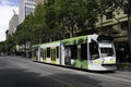 PTV Public Transport Victoria tram travels down Swanston Street in Melbourne