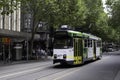 PTV Public Transport Victoria tram travels down Swanston Street in Melbourne