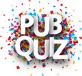 Pub quiz sign with colorful confetti.