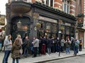 Historical London public house Pub in London, England with clients outside enjoying a pint