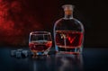 Pub still life of brandy in a glass and decanter Royalty Free Stock Photo